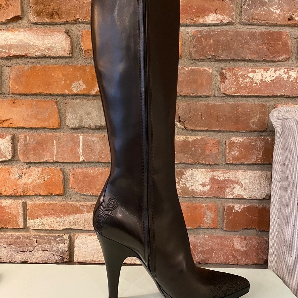 Prada black embossed boots.